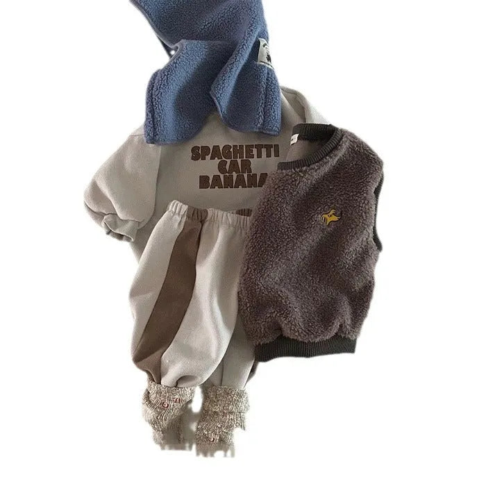 Children's blue long-sleeved cotton letter sweater on child front view