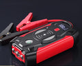 Red 12V car emergency jump starter power pack with digital display and air pump, showing 39800W output.