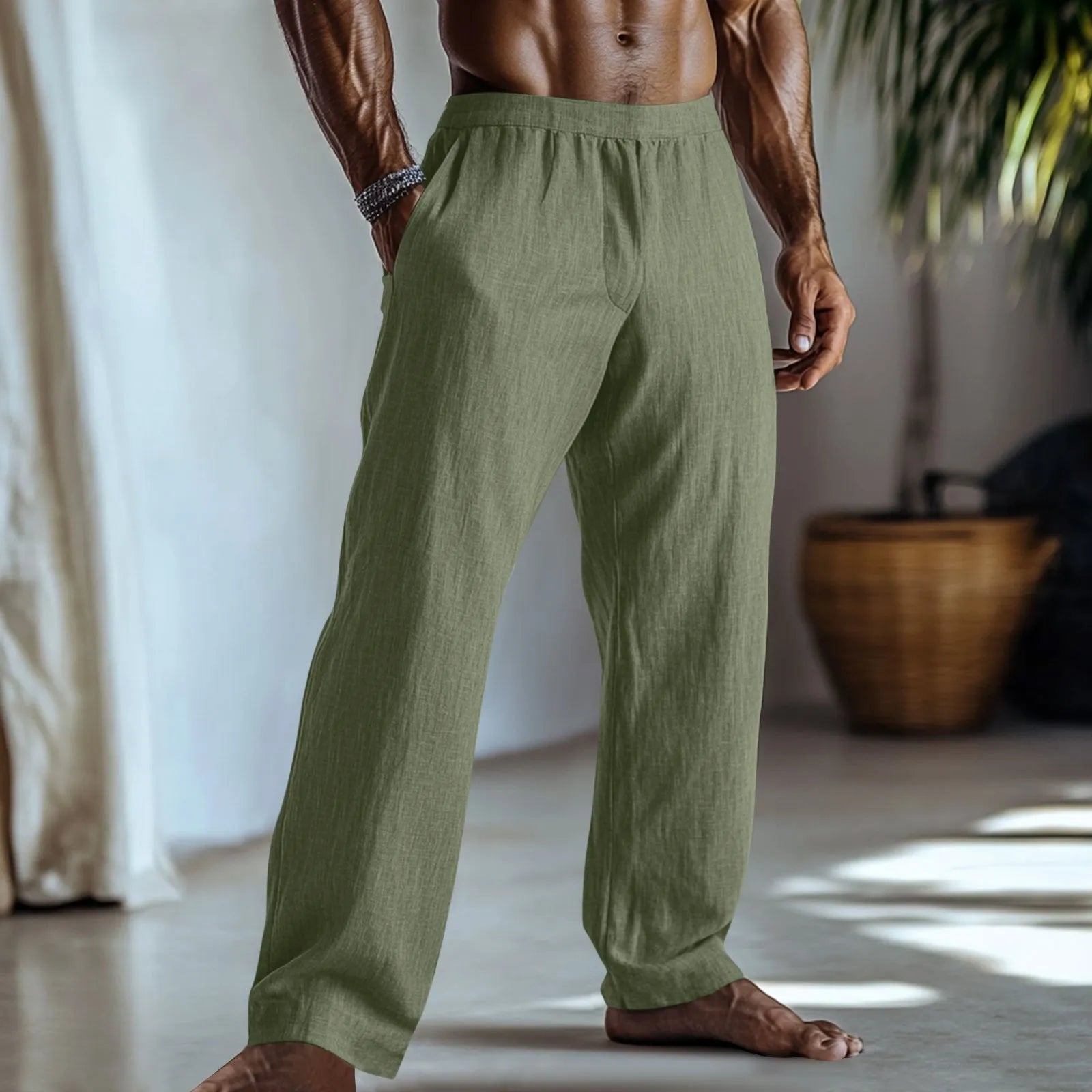 Straight-leg cotton and linen casual trousers in a light green colour, shown with visible pockets.