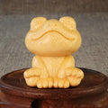 Solid bamboo smiling frog carving ornament measuring 5cm height with cartoon style design