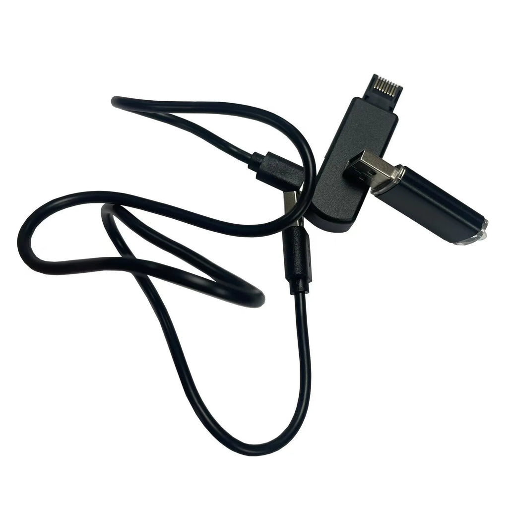 Black JB Tool USB adapter for PlayStation 5 with aluminium alloy casing and Ethernet port.