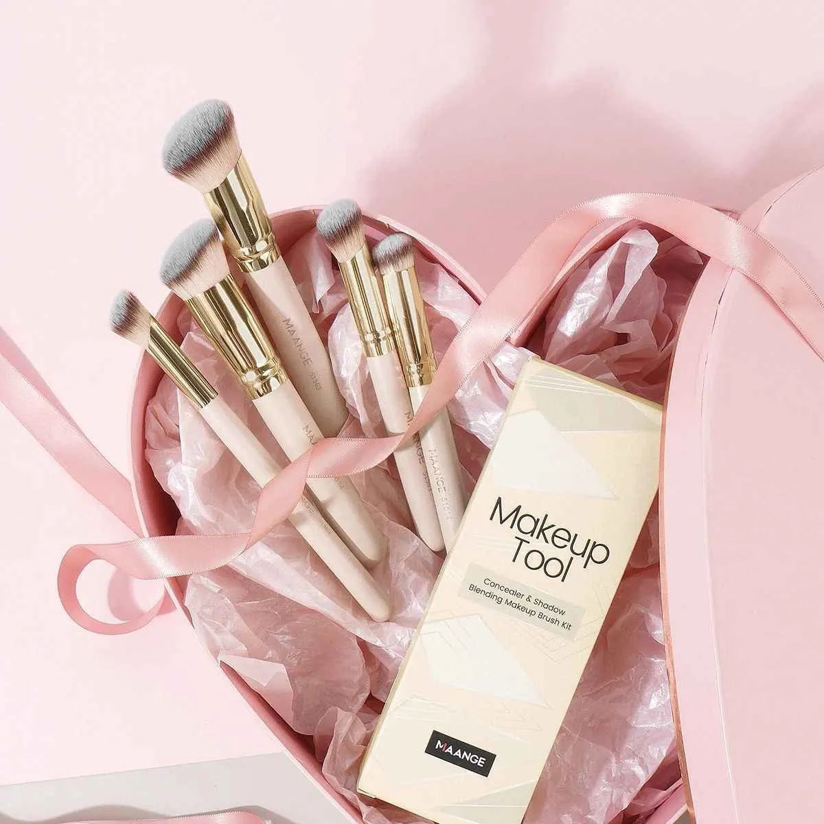 Five angled apricot makeup brushes for blush and contour application
