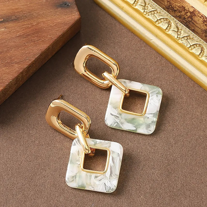 Copper geometric square earrings with hollow design and chamfered corners