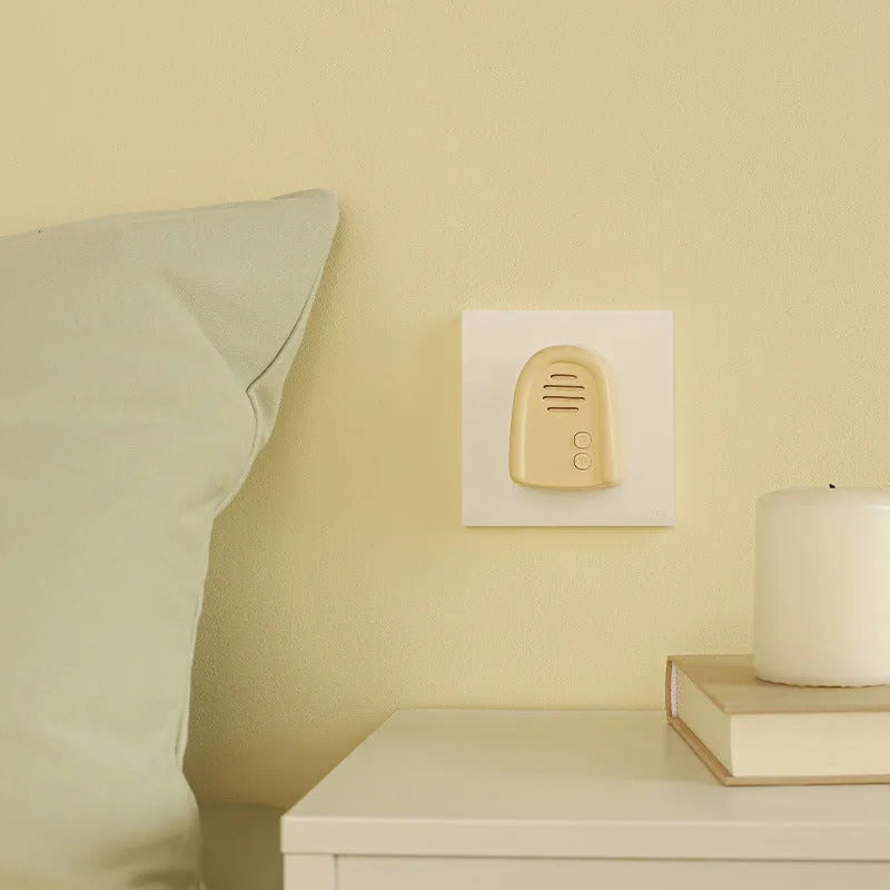 Household wireless plug-in doorbell with self-generating beeper in milky yellow or white colour