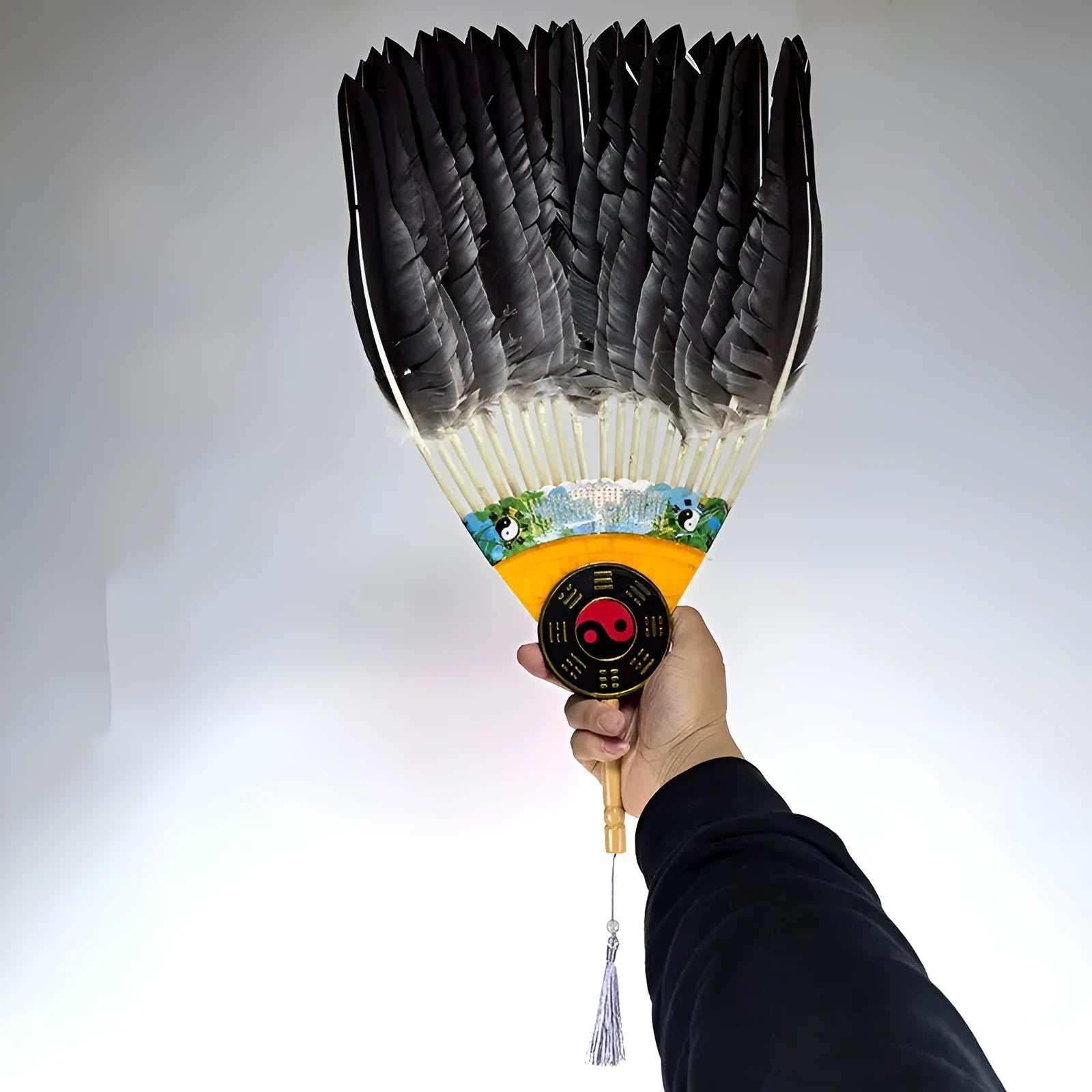 Handmade Chinese craft fan with goose feather and integrated lens fan, graphic colour pattern