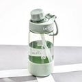 Plastic drinking cup with cartoon pattern in grey, green and pink colours showing three capacity options