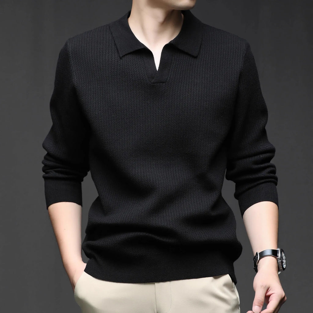 Man wearing a loose green casual pullover sweater, showcasing its autumn leisure style.