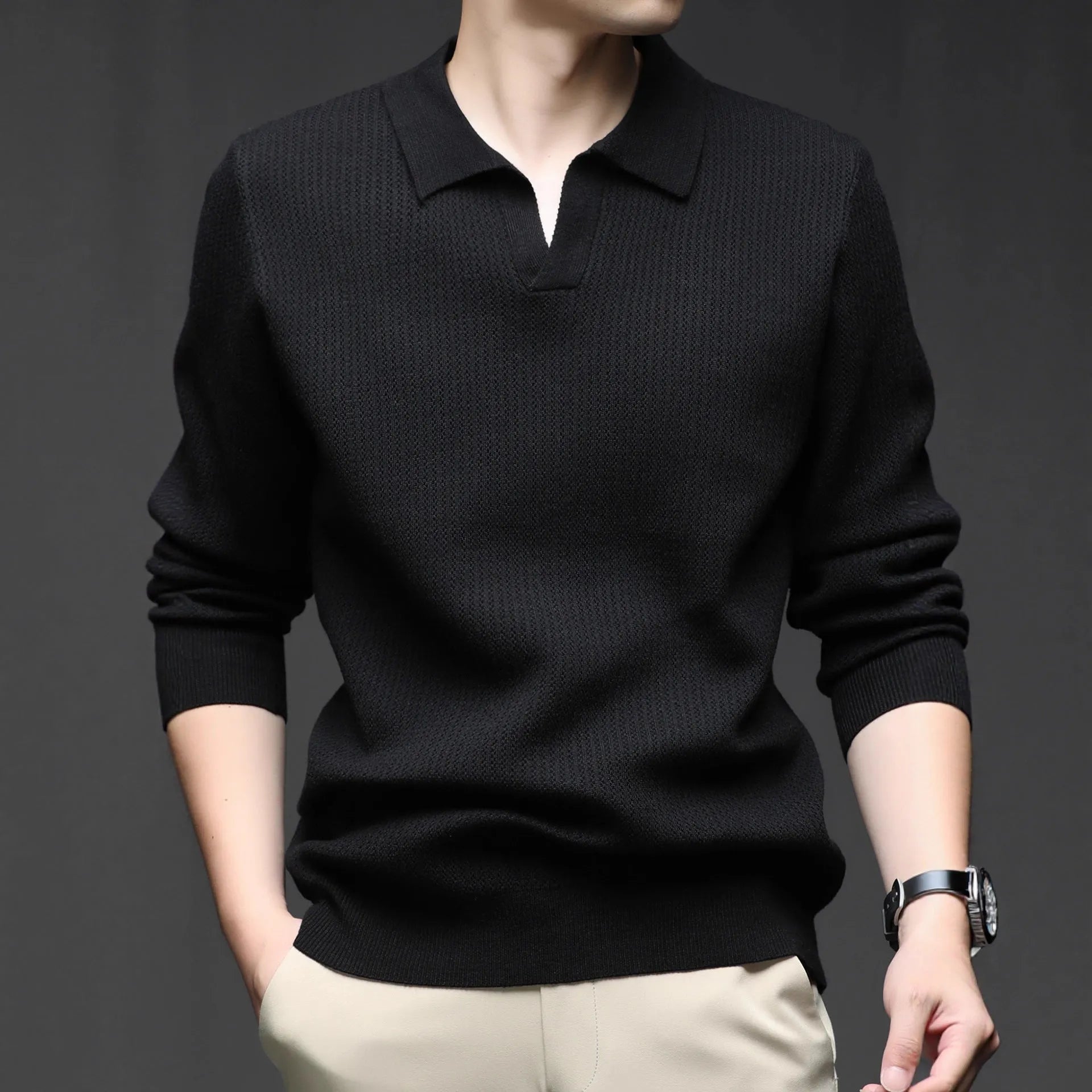 Man wearing a loose green casual pullover sweater, showcasing its autumn leisure style.
