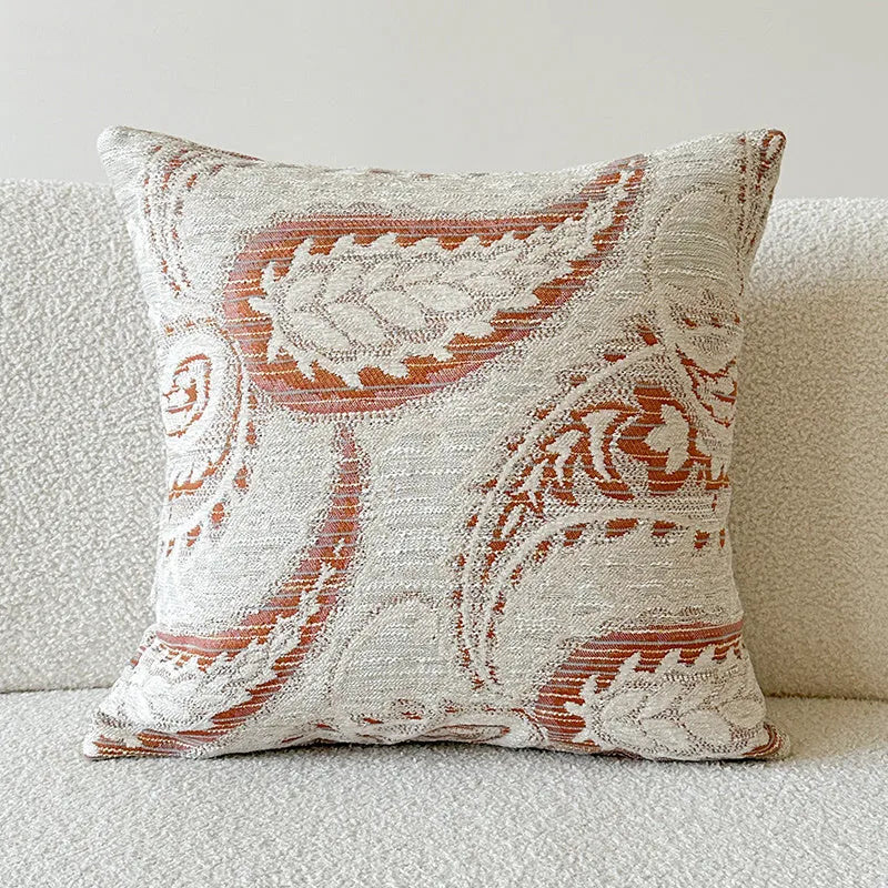 American-style yarn-dyed jacquard sofa cushion with paisley pattern in amber colours