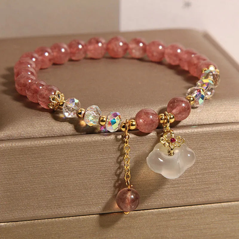 Women's strawberry quartz crystal bracelet with white agate auspicious clouds design
