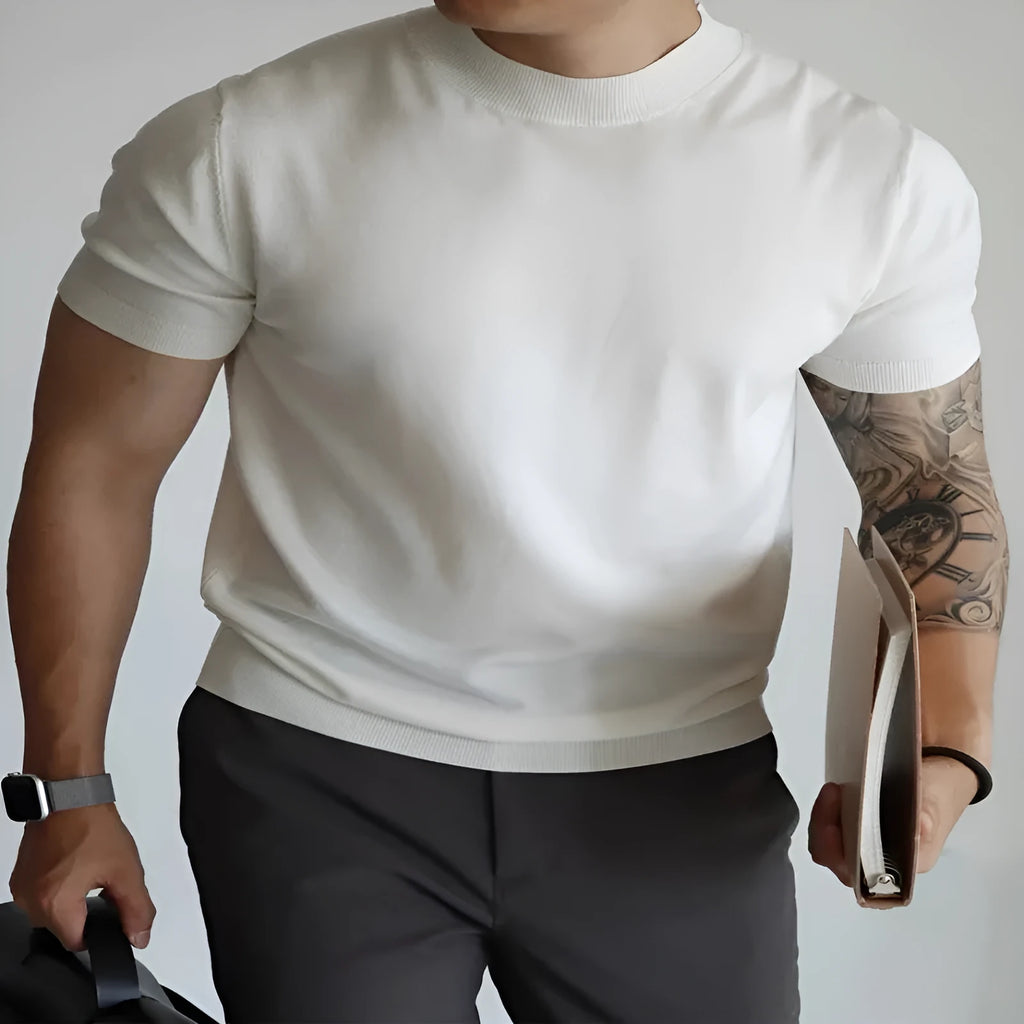 Men's slim-fit solid colour knit t-shirt in breathable polyester fabric on a hanger