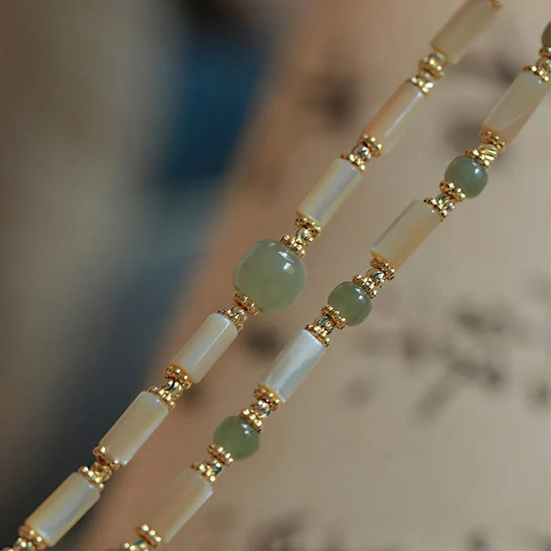 Natural Hetian jade white lip shell bracelet with single round bead minimalist design