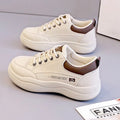 Women's white Korean-style leather pumps with cross straps and round toe, showing lace-up front and 3-5cm heel