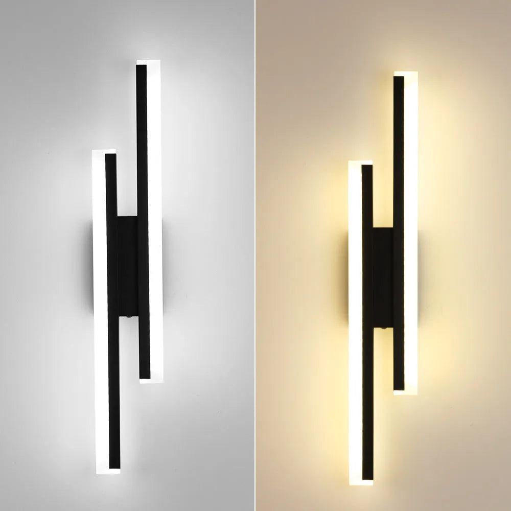 Gold finished double line wall lamp with tri-colour lighting for hotel stairs and modern interiors