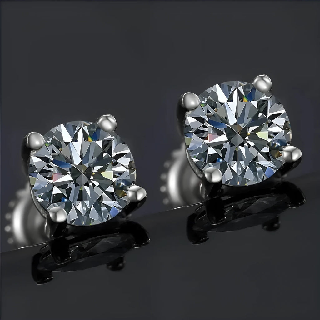Silver geometric moissanite stud earrings with screw back fastening and four claw settings