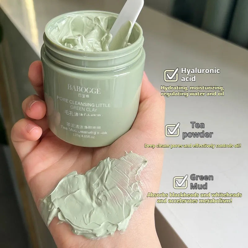 Tea mud cleansing clay facial mask in container with daub-type application