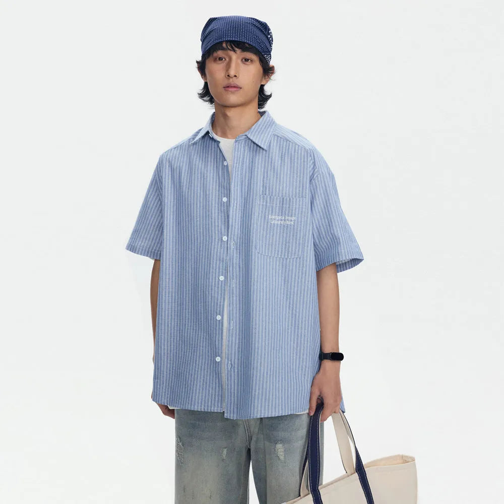Blue striped short-sleeved shirt overalls with cardigan style on mannequin