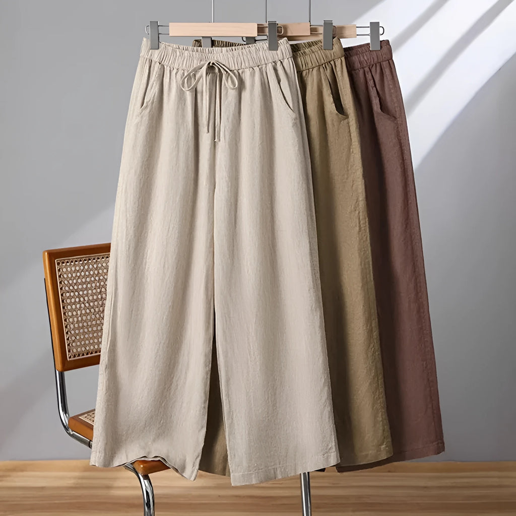 Women's straight leg casual trousers with a drawstring elastic waist in apricot colour.