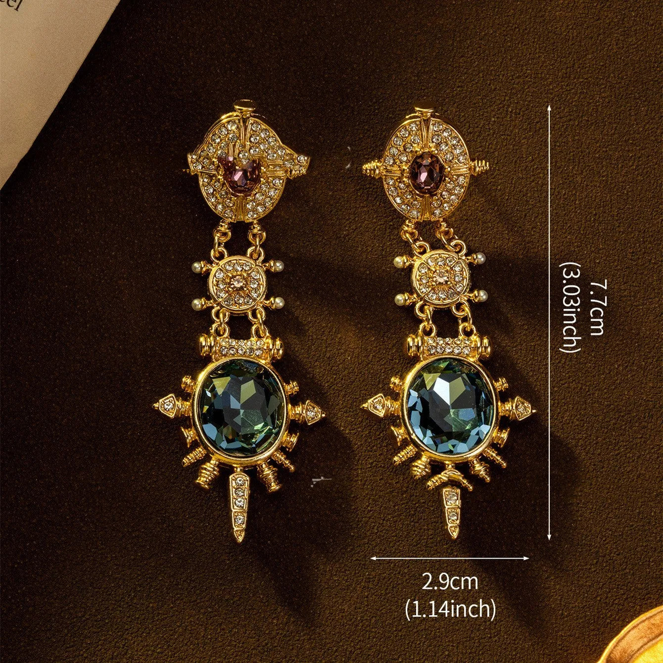 Gold geometric round stud earrings with diamond treatment finish on alloy metal