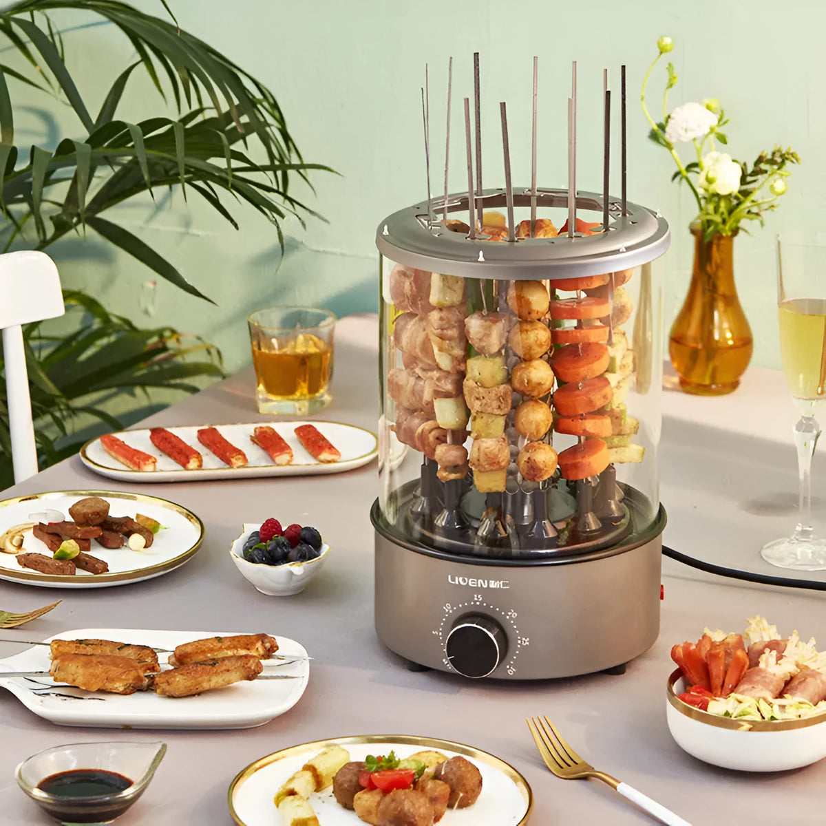 Household electric barbecue oven with automatic rotation, 1100W, 210mm diameter, 210x310mm, on countertop