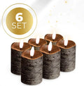 Four black S6 LED pillar candles arranged together, each measuring 5 cm wide by 7 cm tall