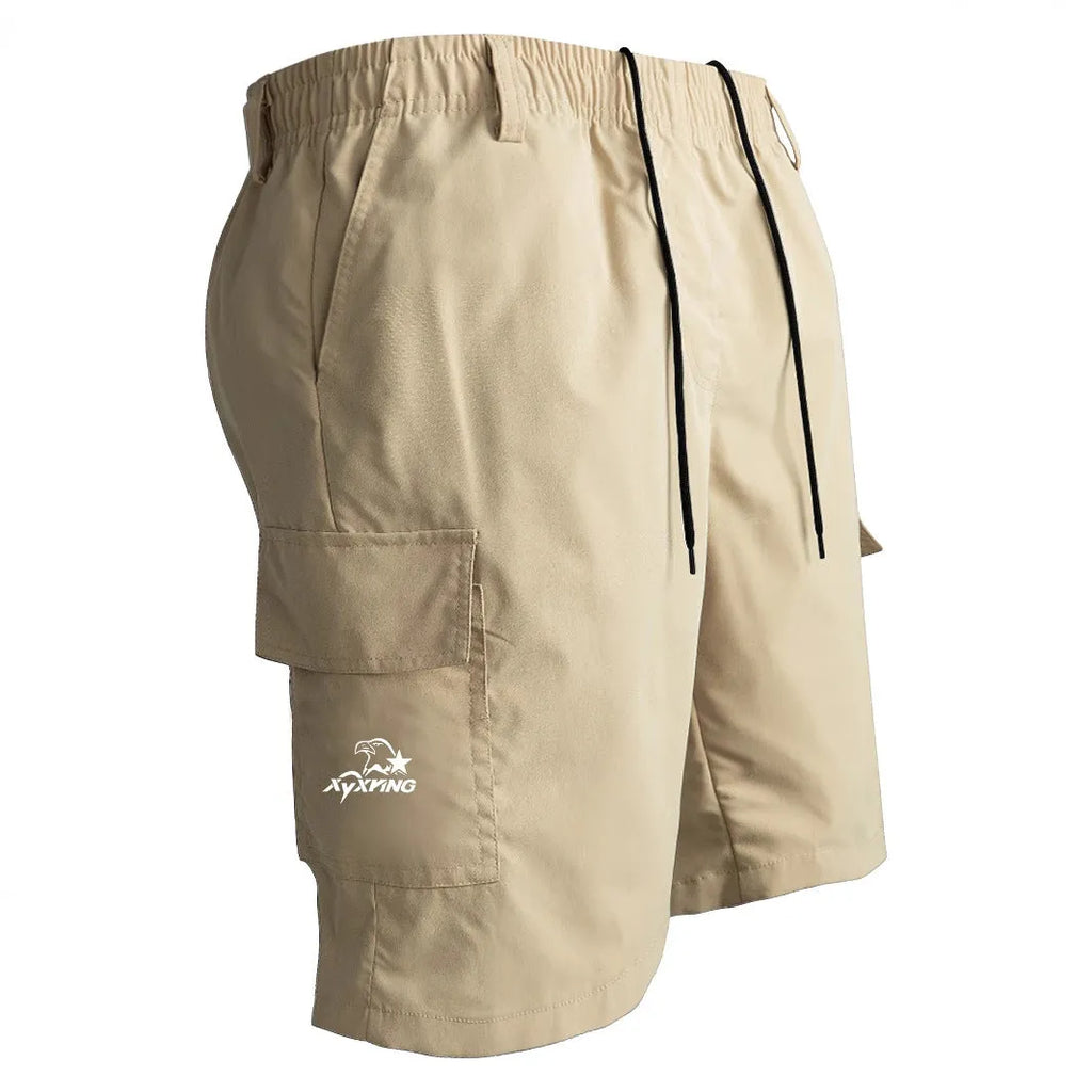 Man wearing loose straight-leg casual shorts in polyester fabric, available in black, blue, green, and khaki colours.