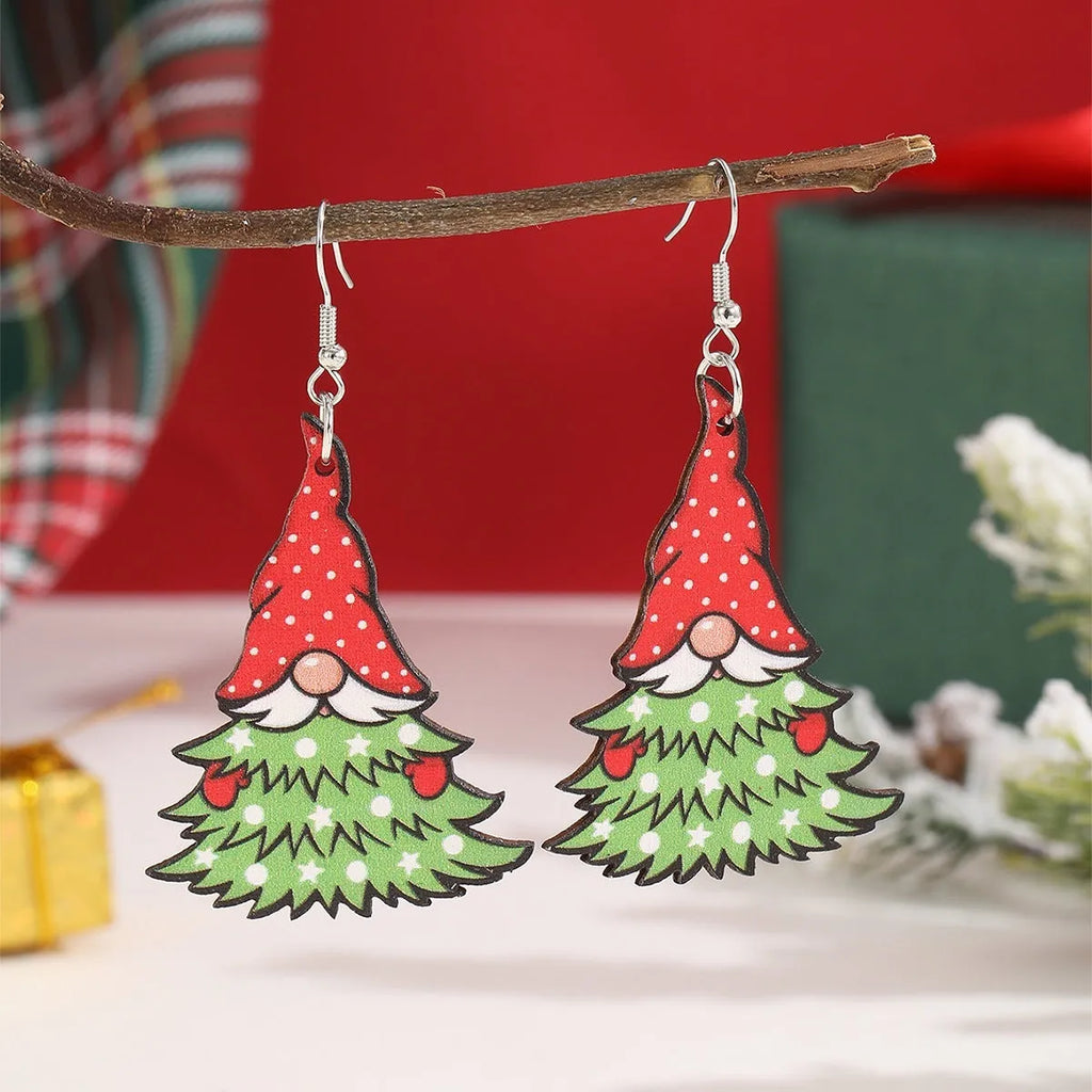 Wooden Christmas earrings with geometric shapes and printed festive designs