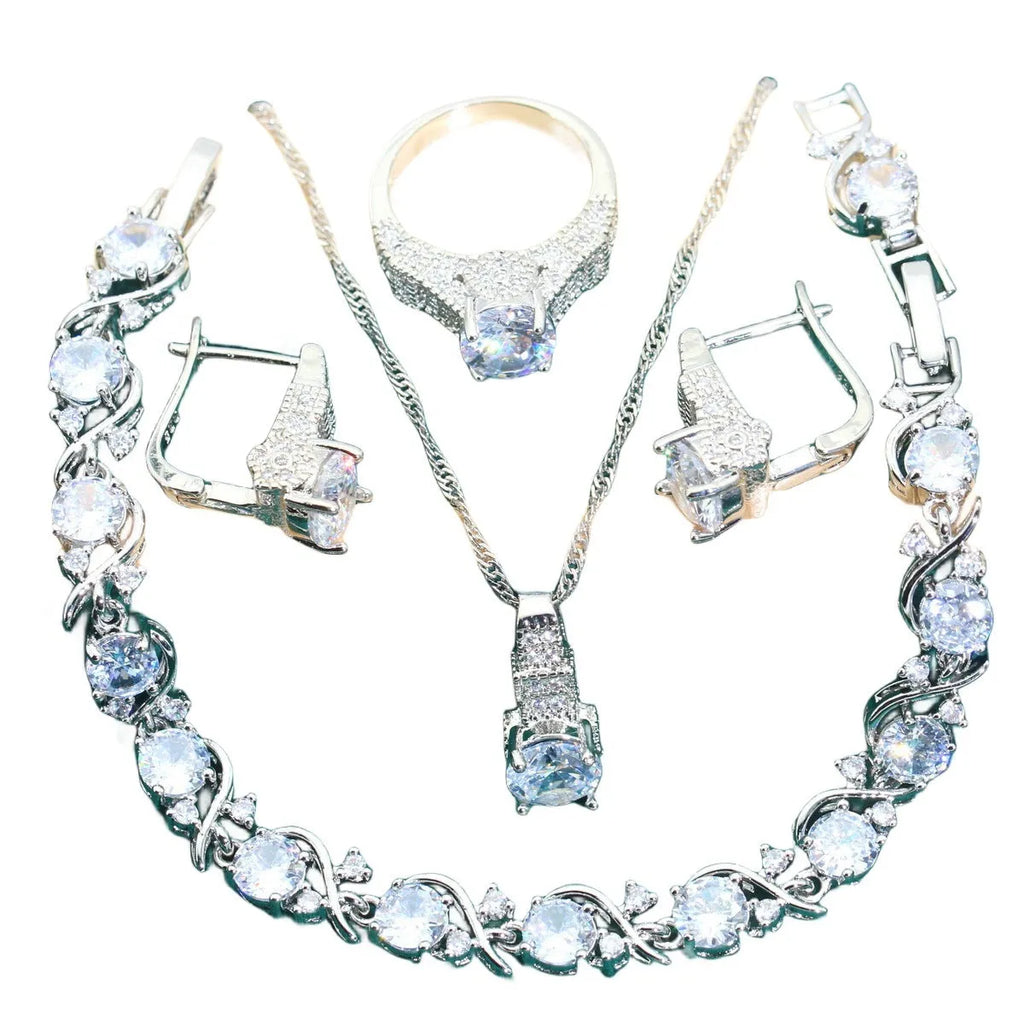 Bridal zircon necklace, bracelet, earrings, and ring four-piece jewellery set in alloy with water wave chain design.