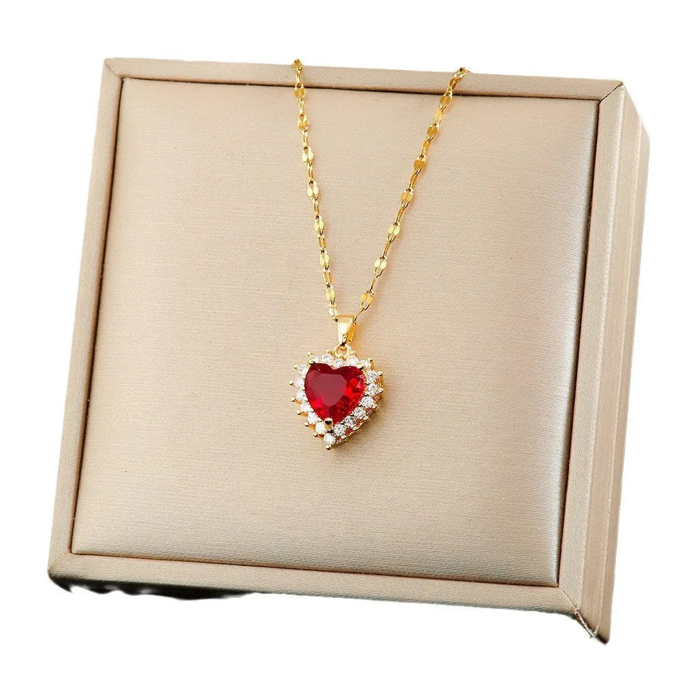 Titanium steel necklace set with heart flower pendant, matching earrings and ring in gold red finish