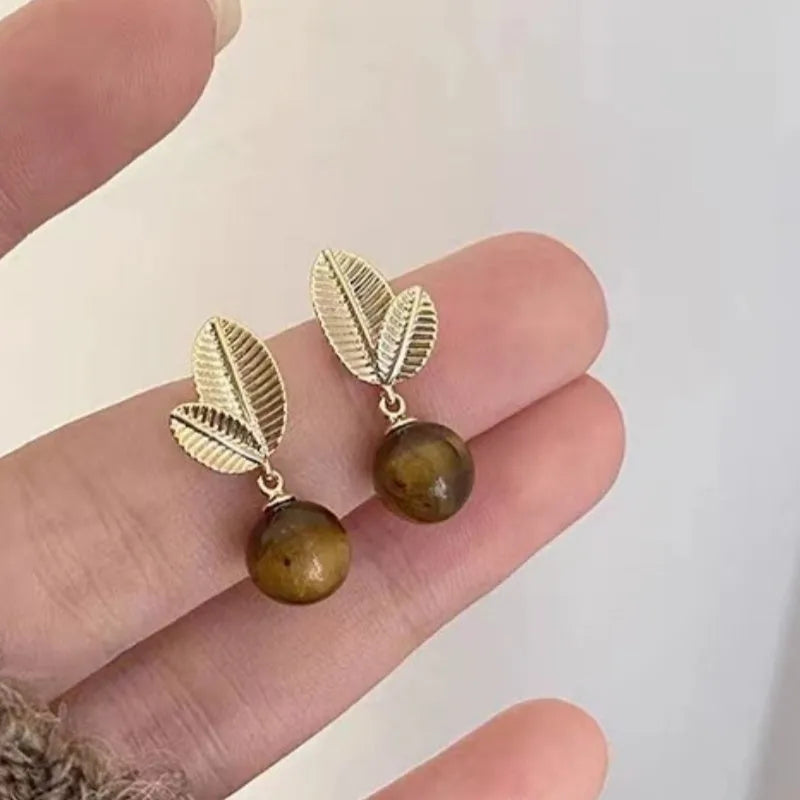 Alloy geometric stud earrings for women in colour 7400