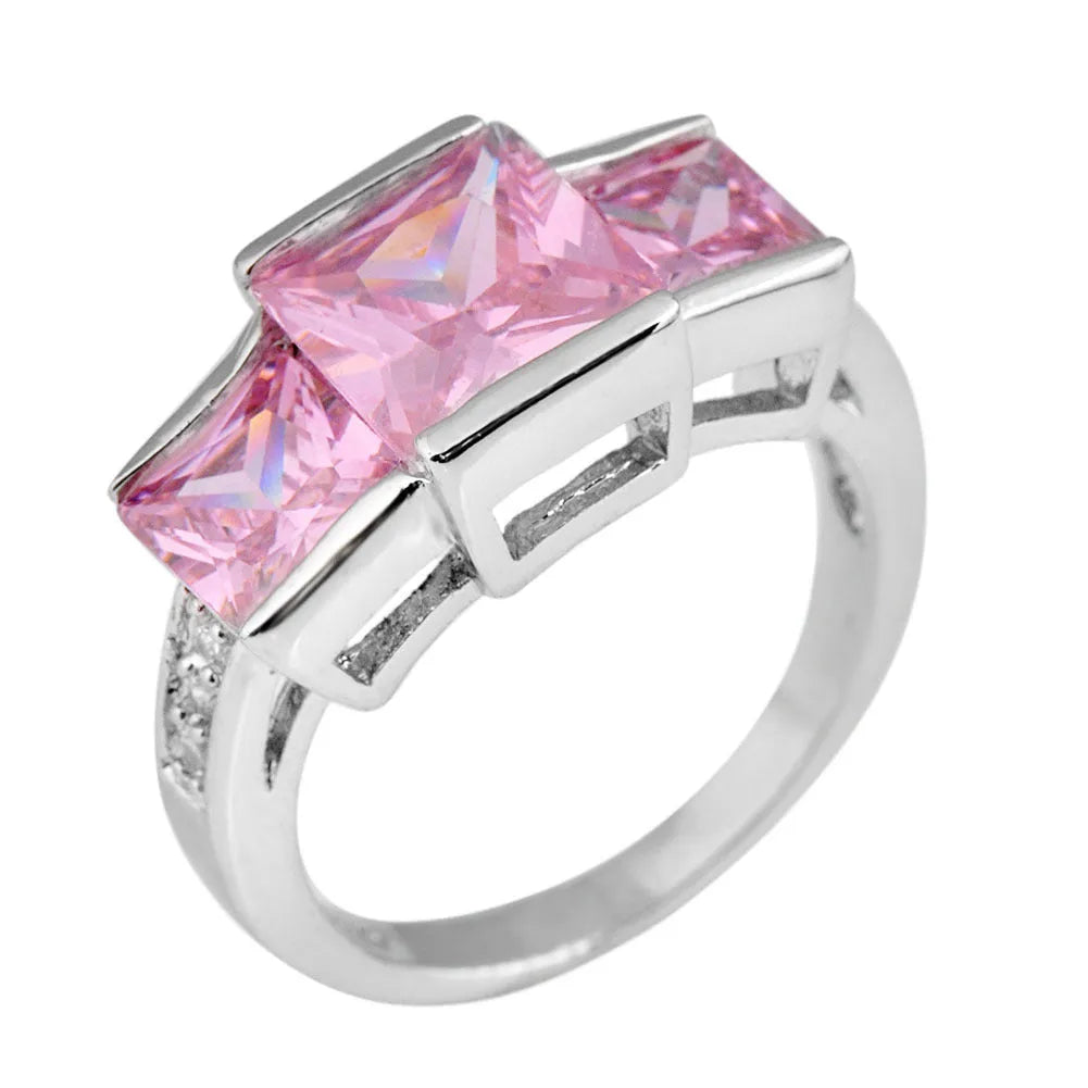 Copper ring ornament in various colours showing geometry and rainbow elements with size options