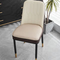 Leather horseshoe-shaped seat cushion in a solid colour showing its non-slip base and thickness.