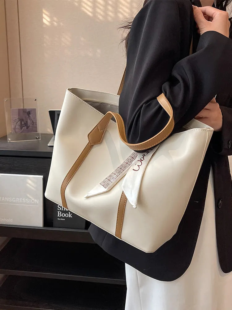 Women's large capacity casual tote shoulder bag in soft bucket design with crossbody strap