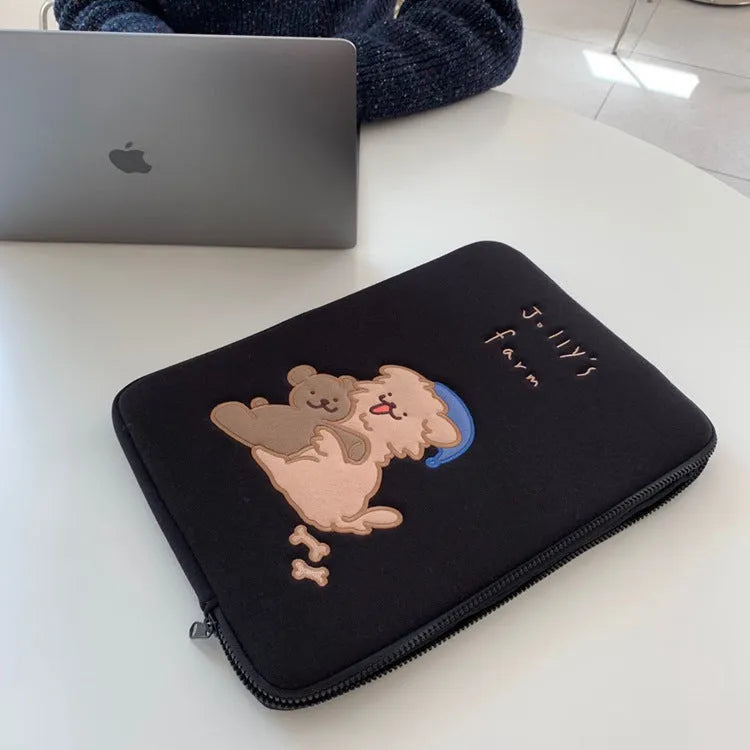 Embroidered animal design laptop sleeve for 13.3 to 15.6 inch computers.