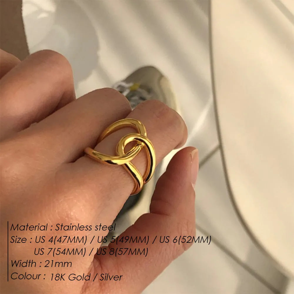 Adjustable stainless steel ring with knot design in U-shape, available in gold or steel colour