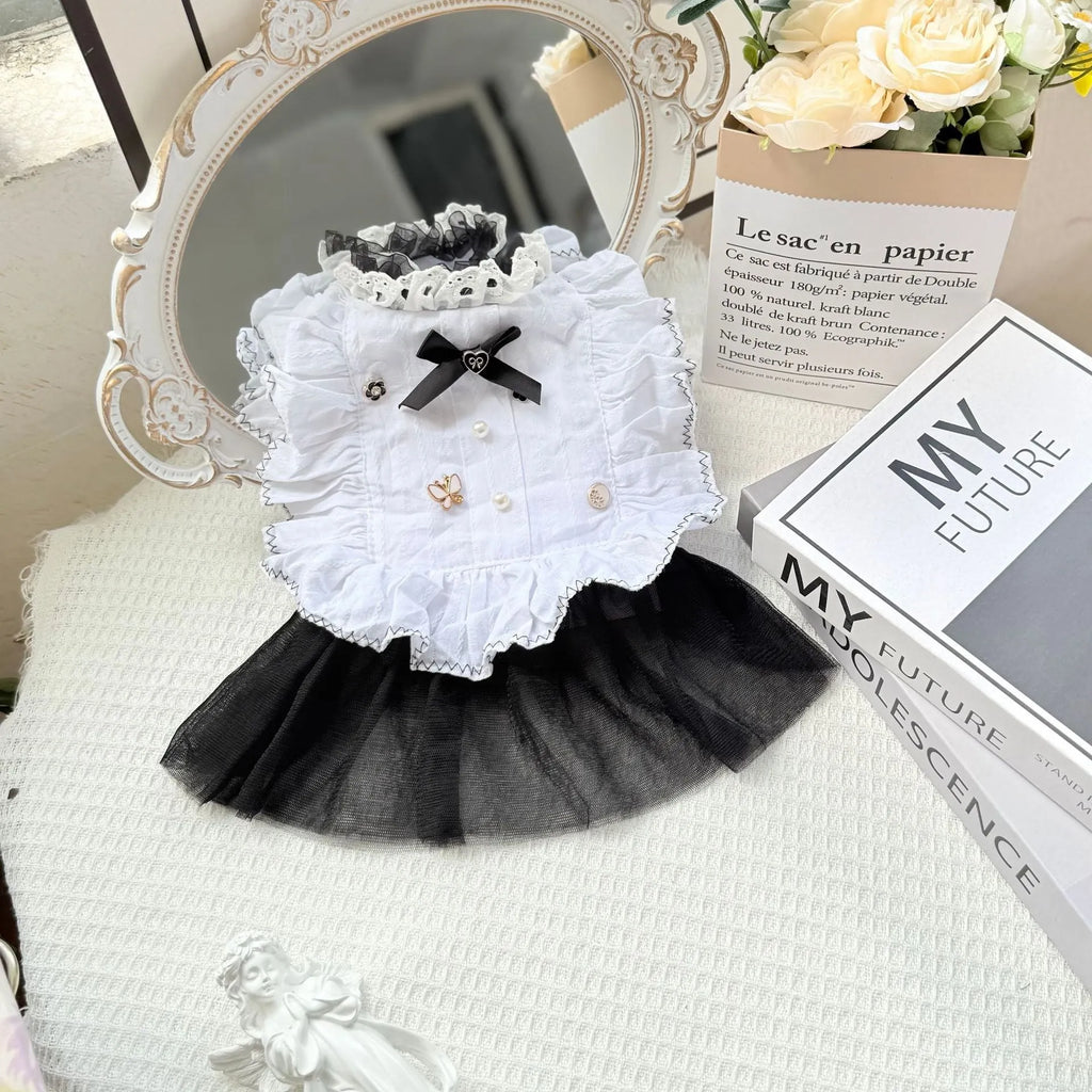 White princess-style gauze skirt dog dress on a mannequin, showing the layered skirt design.