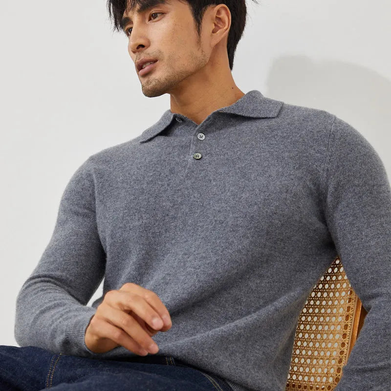 Man wearing a sapphire blue cashmere polo collar pullover sweater in a loose fit.