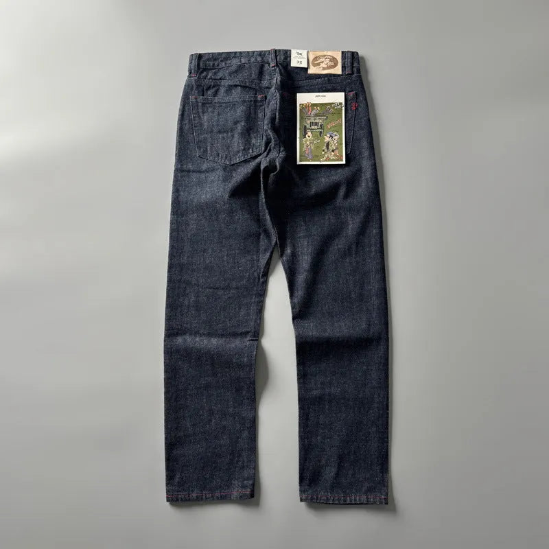 Men's primary colour American retro straight-leg denim trousers laid flat, showing mid-waist and full-length cut.