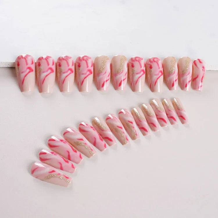 Wearable manicure set with 24 medium false nails in rose, tulip, leopard print, and XINGX patterns, plus glue.