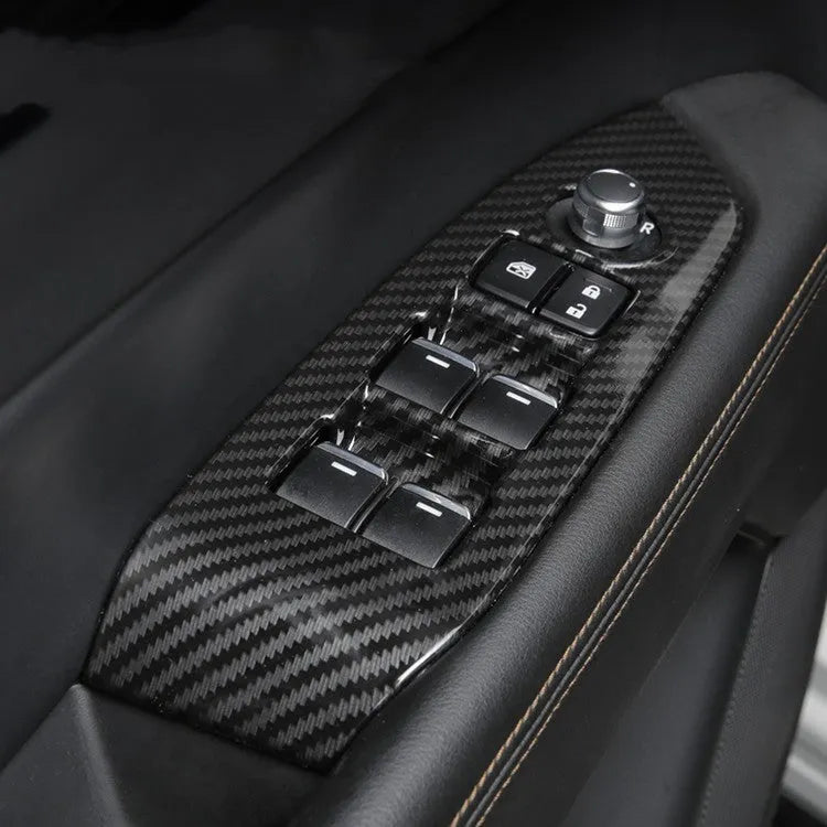Pair of black carbon fibre textured steering wheel frame covers for car interior customisation