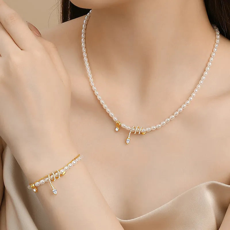Pearl snake bracelet with geometric design in 925 silver with gold or white gold electroplating