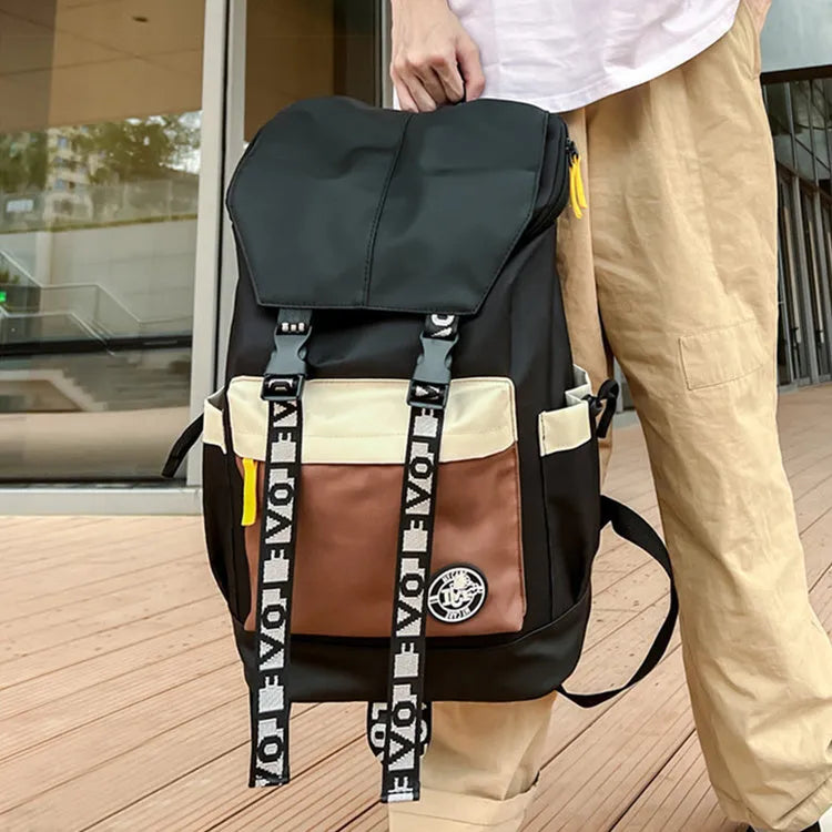 Oxford cloth backpack showing three carrying methods: handheld, shoulder, and backpack style