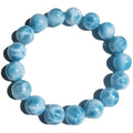 Blue Bodhi bracelet with pearl elements, showing Maillard style and range of bead sizes.