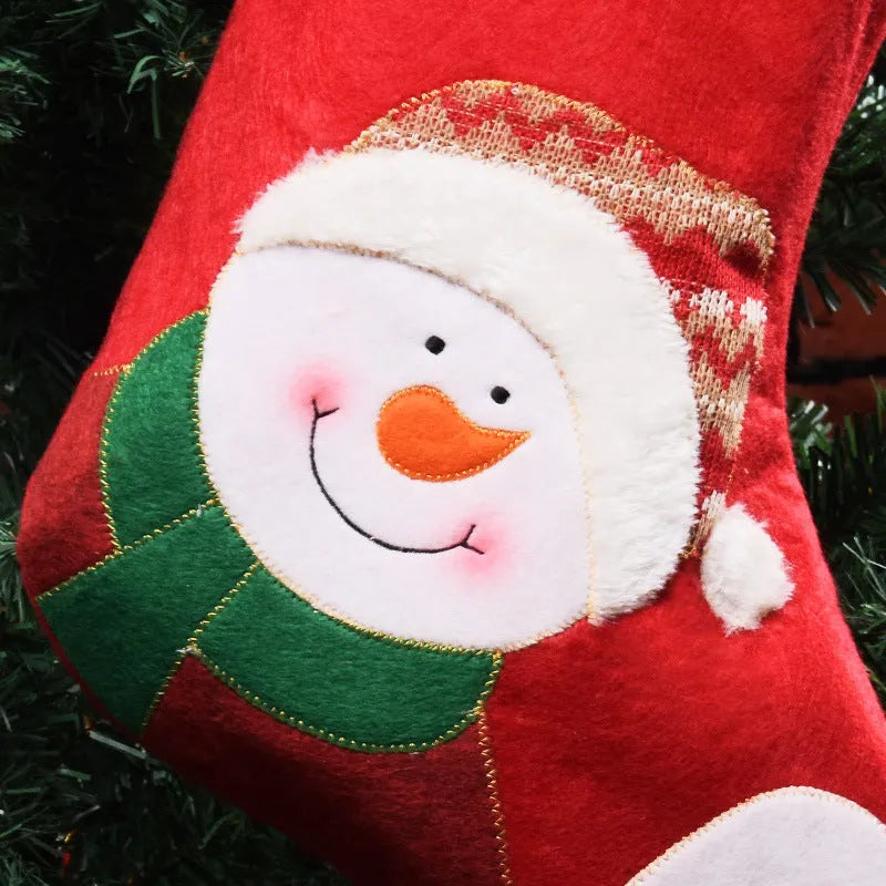 Handmade non-woven Christmas candy stocking with elk, snowman, and grandfather designs