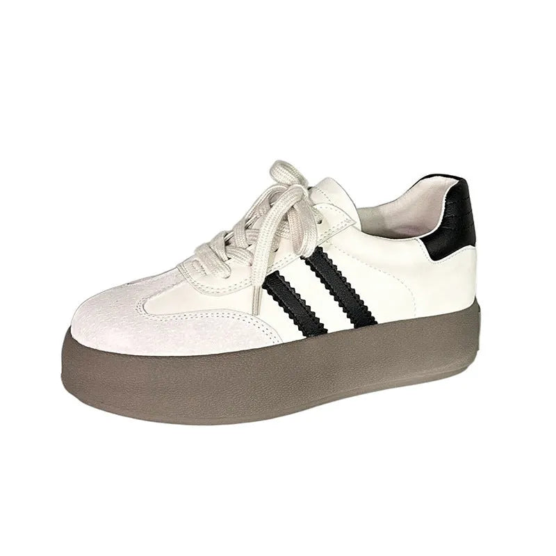 Women's vintage distressed leather sneakers with round toe and lace-up design in beige colour
