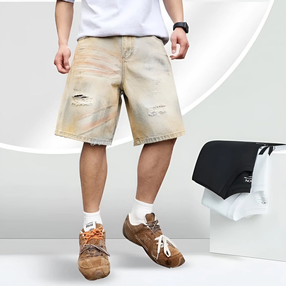 Men's light blue ripped denim shorts showing straight-leg design and mid waist fit