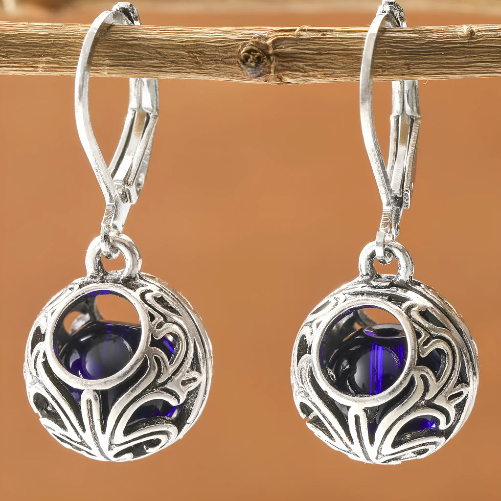 Women's silver geometric hollow pendant earrings with vintage engraving and blue gemstone accents