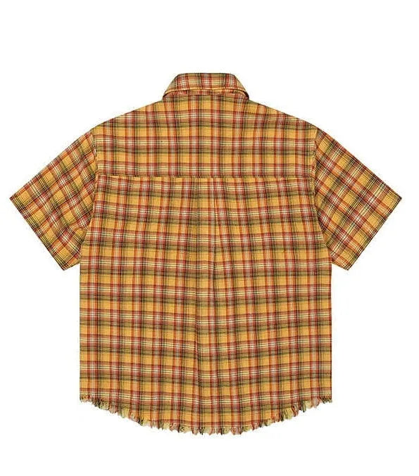 Yellow and white plaid short sleeve shirt with embroidery detail on chest pocket.
