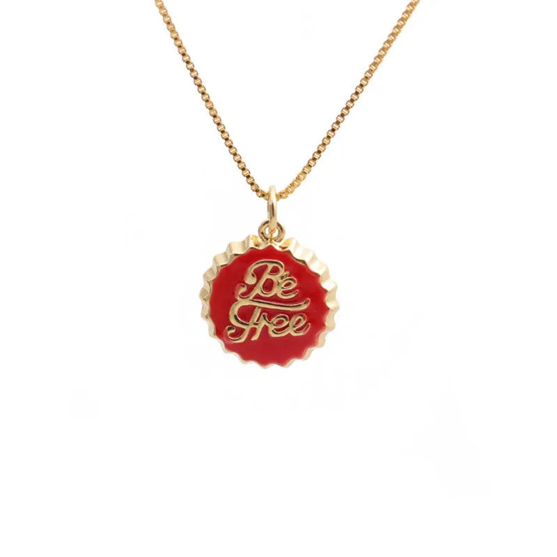 Copper 18K gold plated bottle cap pendant necklace with 40cm box chain on a neutral background