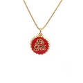 Copper 18K gold plated bottle cap pendant necklace with 40cm box chain on a neutral background